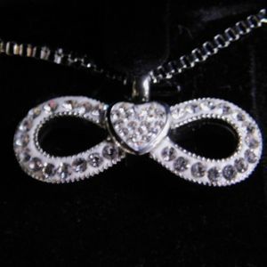 Bow Tie Infinity Urn Ashes Pendant Necklace